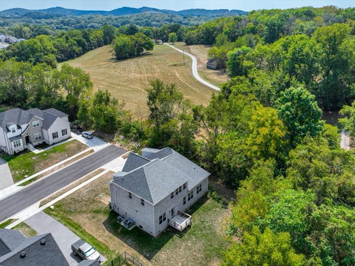 Open pasture begins directly across the road