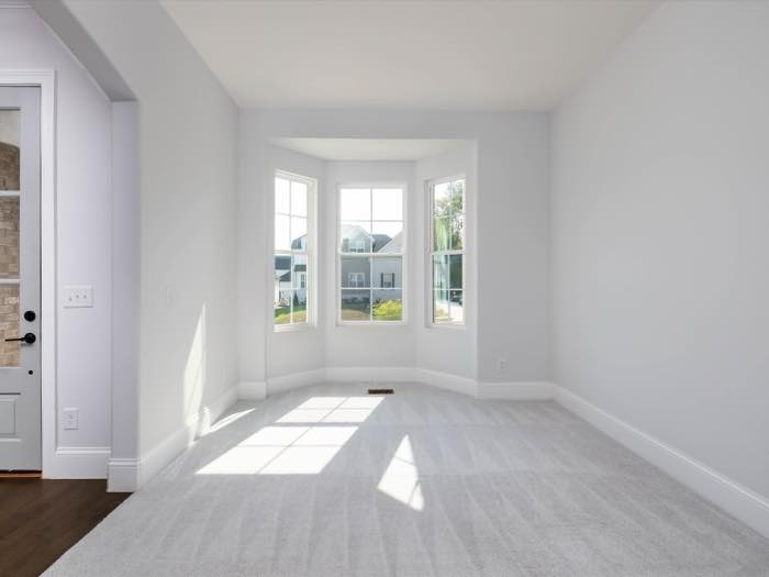 Bay-window sitting room off the entry