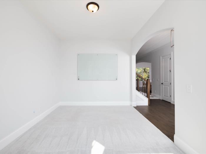 Study, carpeted and closed off from the entry