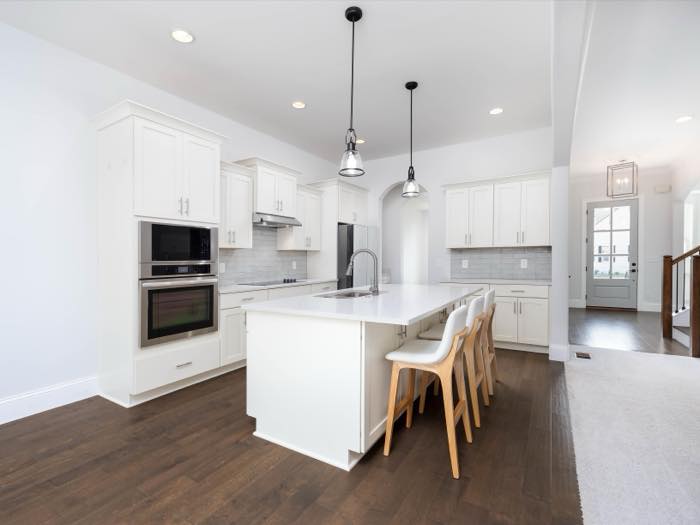 Wall ovens, gas cooktop, and vented hood