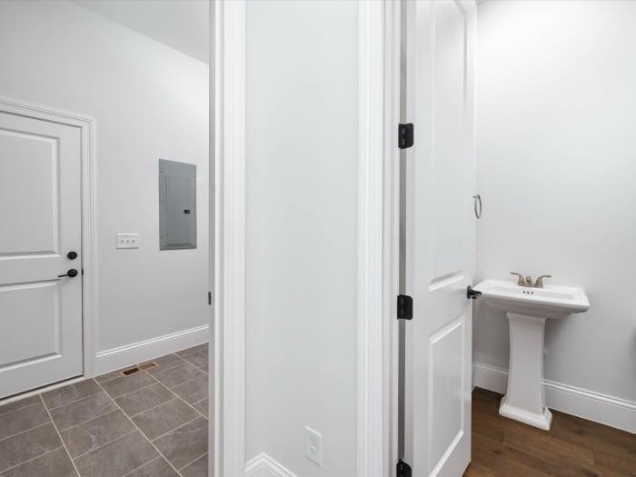 Powder room off the rear hall