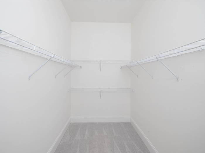 Primary walk-in closet, double-hung