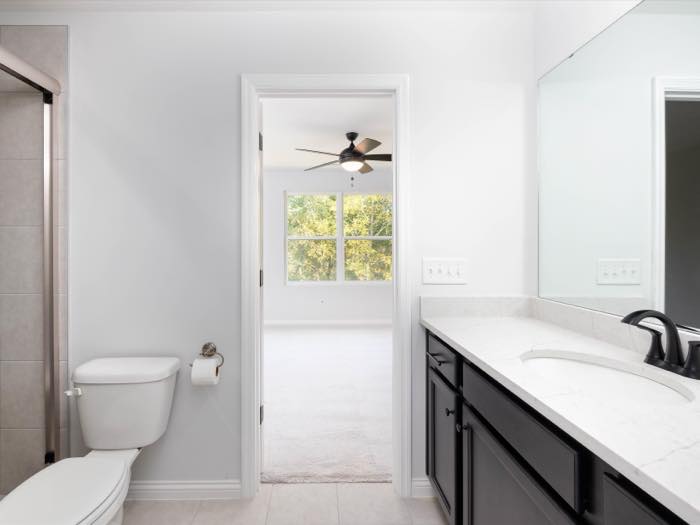 Bath opens directly into the bedroom