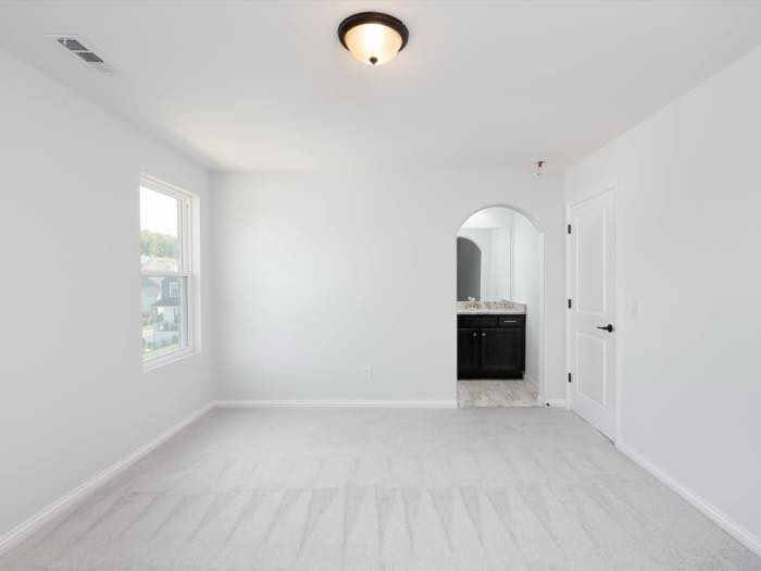 Bedroom with a built-in vanity alcove
