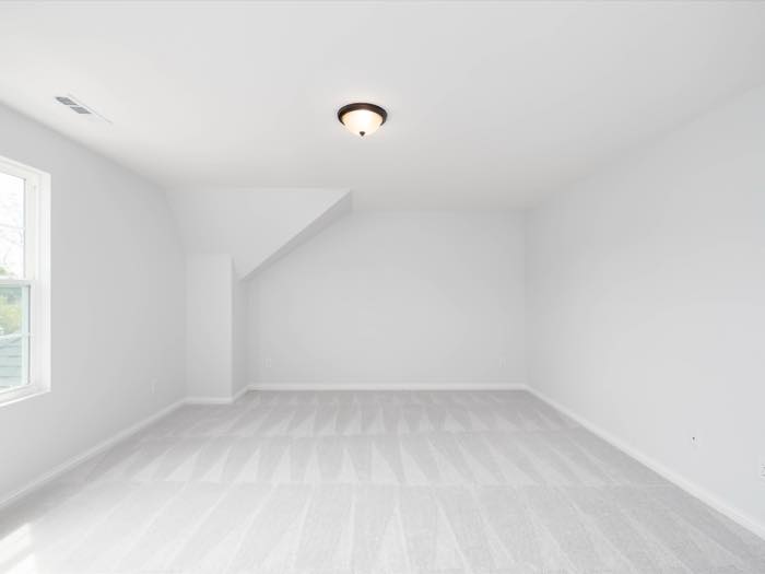 Dormered bedroom above the garage