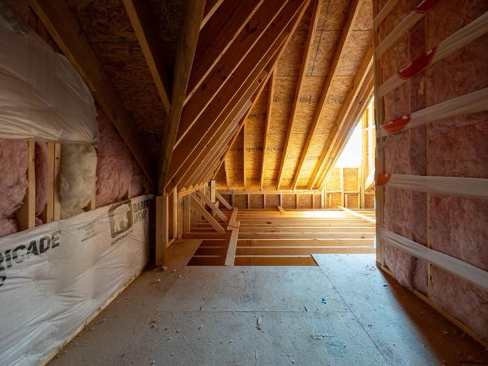 Walk-in attic storage, decked and lit