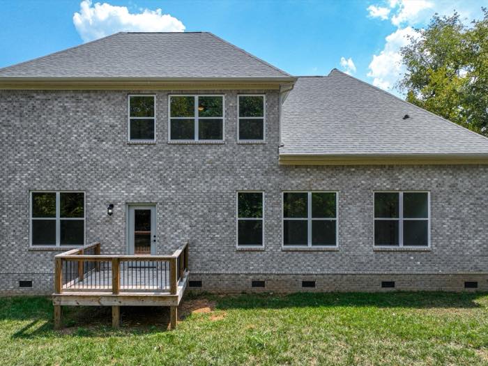 Rear elevation with the deck off the breakfast nook